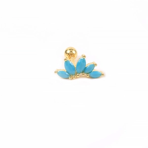 Detailed close-up of S925 silver golden crown stud with blue marquise-cut gems