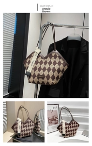 Detail of checkered tote bag with V-shaped opening and brand label in brown and beige