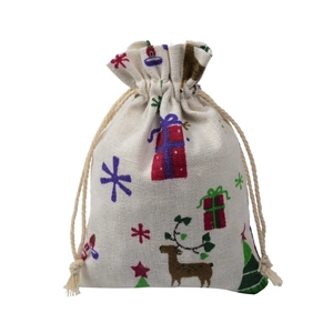 Detail view of cotton linen drawstring bag featuring Christmas reindeer and tree prints