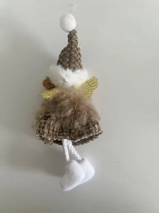 Detail of a handmade Christmas angel pendant with brown knit fabric and gold wings