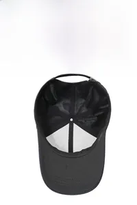 Internal view of black baseball cap showing breathable mesh, sweatband, and 6-panel structure