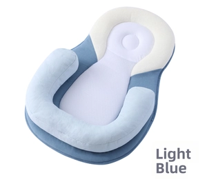 Breathable baby lounger with cyan blue support cushion and mesh head positioning area