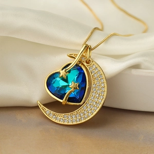 18K gold plated moon and heart pendant necklace with blue zircon and silk background