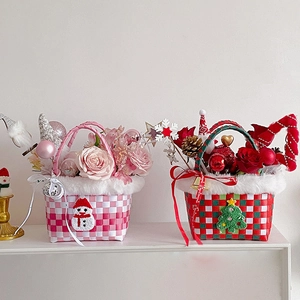 Christmas gift baskets featuring snowman and tree motifs with preserved flowers