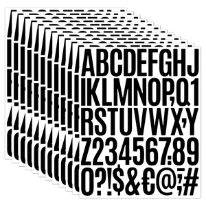 Close-up of 2 inch black vinyl alphabet stickers showing stacked sheets of letters and numbers