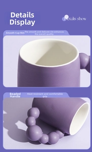Detail view of purple ceramic mug featuring unique beaded handle and smooth matte finish