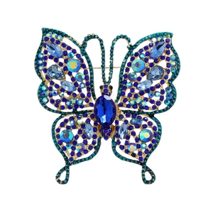 Broche papillon vintage ajourée avec strass bleus et base en métal doré pour femme