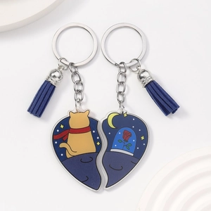 Acrylic heart puzzle keychain with blue tassel featuring cat and rose illustration