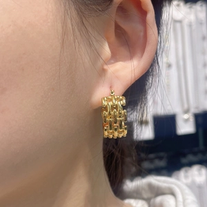 Elegant gold hollow braided chain earrings for women in a vintage metal style