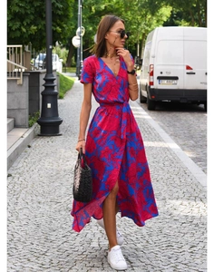 Detail of vibrant floral print midi dress with a stylish wrap V-neck and high waist tie