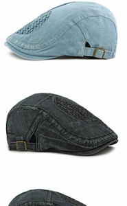 Detailed side view of washed denim beret with mesh diamond pattern and metal buckle