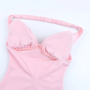 Detail of pink sweetheart neckline with fine stitching and elastic straps on a slim dress