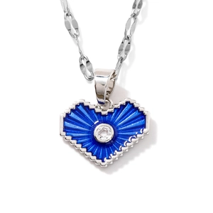 Elegant silver heart necklace with blue enamel sunburst texture and center zircon stone