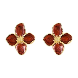 Vintage dark red enamel flower stud earrings with golden pistils and retro design