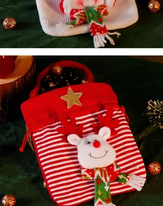 Close-up of knitted Christmas gift bag with 3D reindeer design and golden stars details