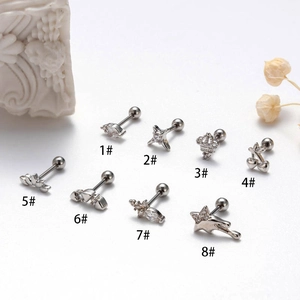 Eight assorted stainless steel stud earrings with cubic zirconia and screw-back designs