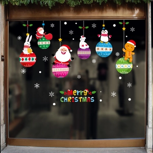 Détail de stickers de Noël pour vitrines avec Père Noël, ours polaire et texte Merry Christmas