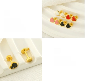 Detail of colorful enamel heart earrings in gold finish with screw back design