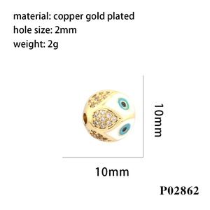 10mm Evil Eye bead in gold plated copper with white enamel and micro paved cubic zirconia