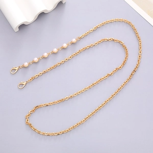 Chaîne bandoulière dorée avec perles rose clair et fermoirs mousquetons pour sacs et téléphones