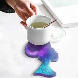 Afro female silhouette resin coaster mold with vibrant purple galaxy nebula pattern