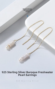 Detail view of s925 silver gold-plated box chain with baroque freshwater pearl earrings