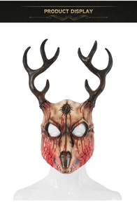 Detailed view of skull mask with deer antlers and realistic red blood splatter effects