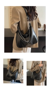 Three-way view of a black faux leather shoulder bag with white contrast stitching and chain