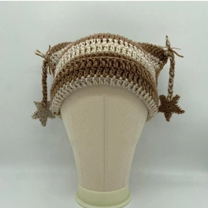 Handmade striped crochet cat ear beanie with stars and tassels in brown and beige