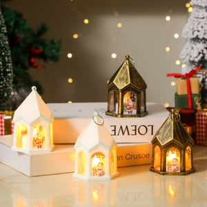 Set of 4 vintage Christmas lanterns with LED lights featuring Santa and snowman patterns
