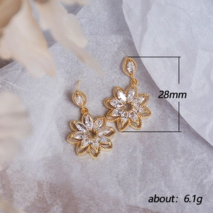 Elegant gold flower earrings with micro-set zircons crystals, measuring 28mm and 6.1g