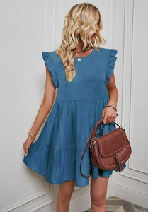 Detailed close-up of blue layered ruffle sleeves and round neck of a summer dress