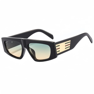 Stylish black chunky frame sunglasses with gradient tea lenses and gold temple accents