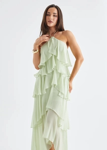 Detailed close-up showing the layered ruffles and sheer chiffon fabric of this mint green dress
