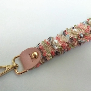 Handmade pearl and tassel wristlet strap with pink leather and gold metal clasp