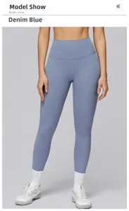 Model wearing high-waisted denim blue yoga leggings with pockets for fitness and running