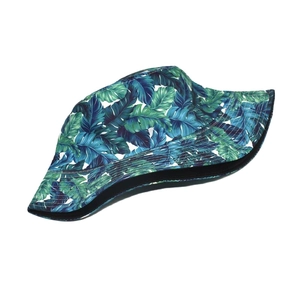 Tropical banana leaf print bucket hat with vibrant floral design for summer beach wear