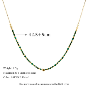 Detail of green malachite bead necklace with star pendant in 18K gold-plated steel