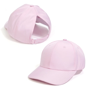 Close-up of pink ponytail baseball cap with a large cutout for high messy buns