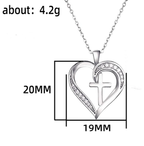 Detailed view of heart cross pendant with measurements 20mm height and 19mm width