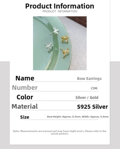 Detail view of S925 silver bow stud earrings in silver and gold showing 8.3x9.4mm size