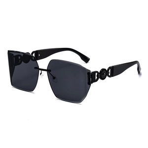 Fashionable oversized rimless sunglasses with black lenses and hollow metal temple decor
