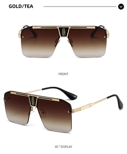 Gafas de sol clásicas de montura grande en metal dorado con lentes de té degradadas