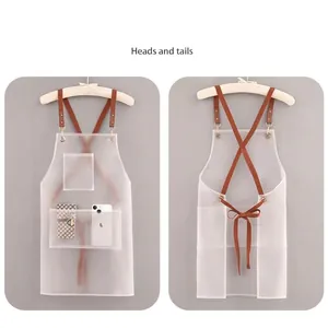 Waterproof transparent TPU apron with adjustable brown straps and phone pocket, front and back