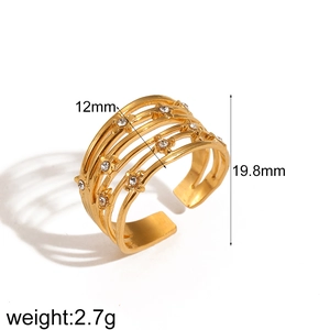Detail view of gold titanium steel ring showing dimensions 12mm width and 2.7g weight
