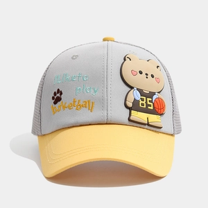 Detailed view of the basketball bear patch and embroidery on a mesh trucker cap