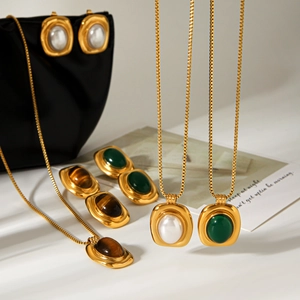 French vintage stainless steel jewelry set with pearl, green stone and tiger eye stones