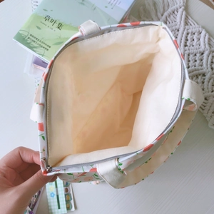 Sac à main en toile à motif floral et pêches avec fermeture éclair élégante