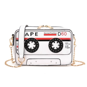 Unique retro cassette tape shaped white shoulder bag with gold chain and handle