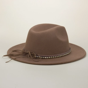 Detail of coffee wool fedora hat featuring woven band and gold metallic bead trim